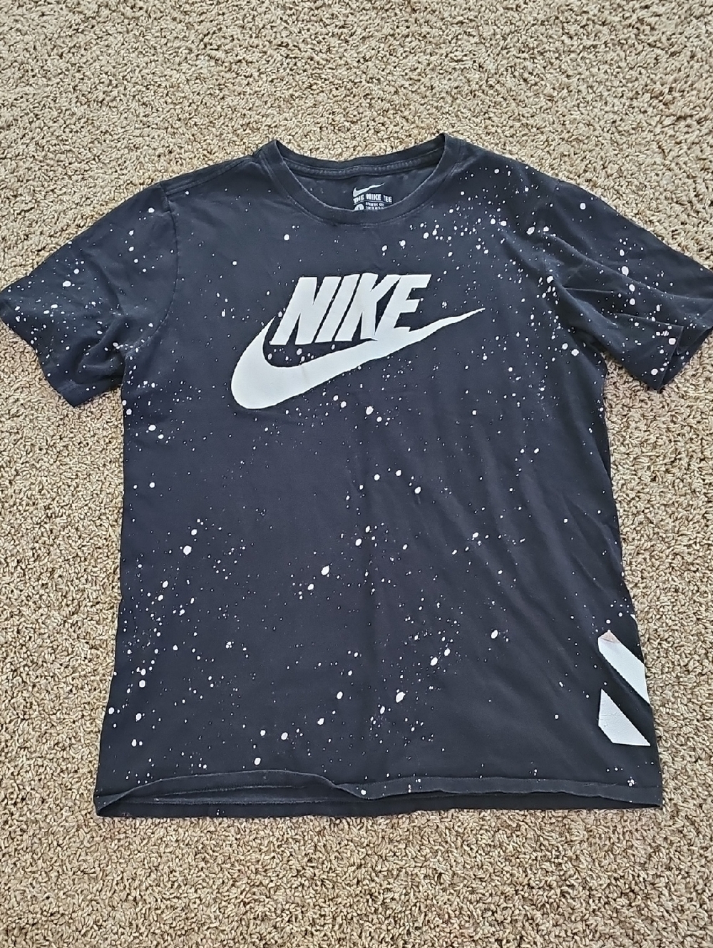 Nike Black Short-Sleeve Tee with White Logo and Paint Splatter
